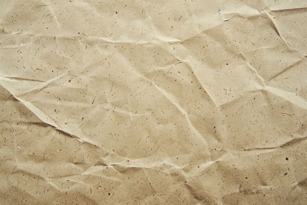 Beige paper texture background outdoors wrinkled.