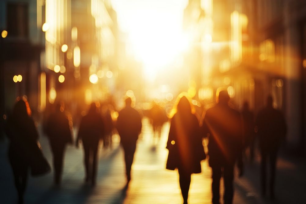 Busy street scene with people walking person light.