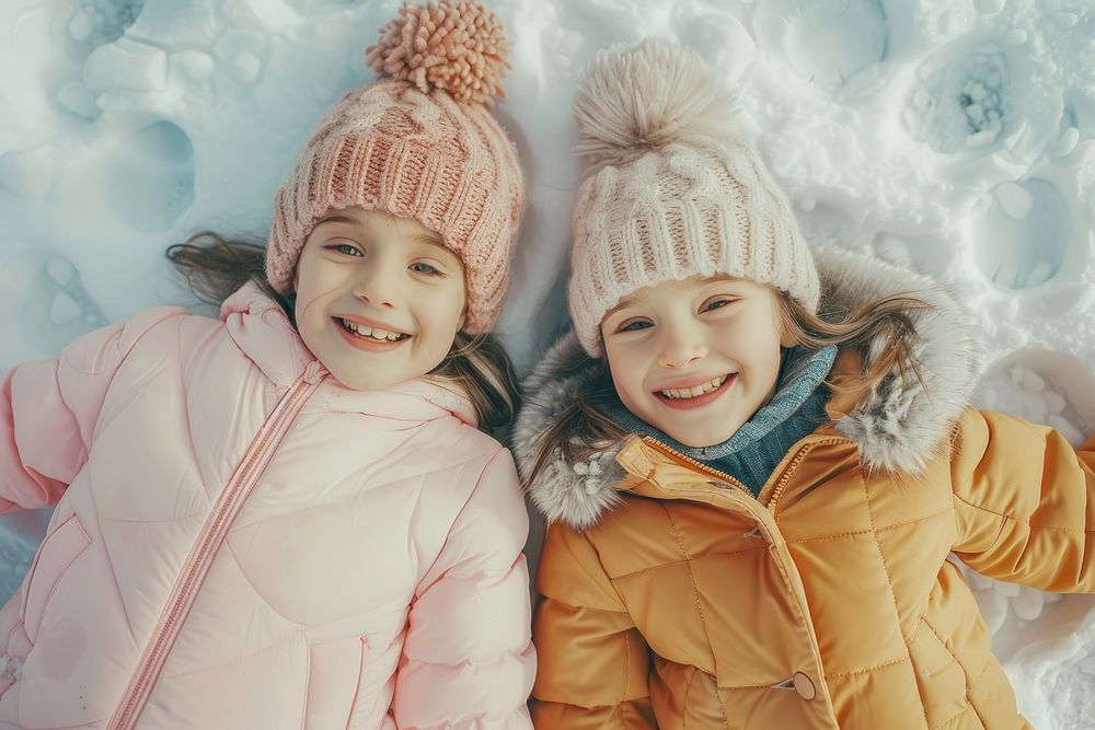 Lay on snow floor portrait happy photo.