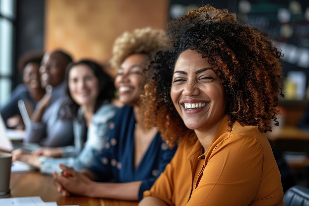 Diverse group smiling in meeting | Free Photo - rawpixel