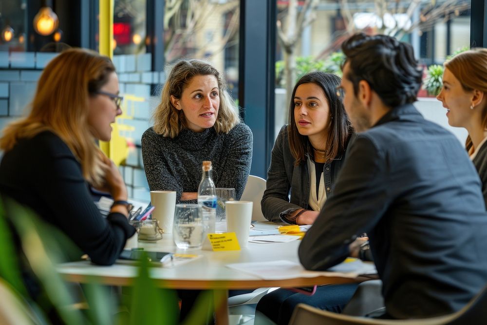 Business meeting in modern cafe