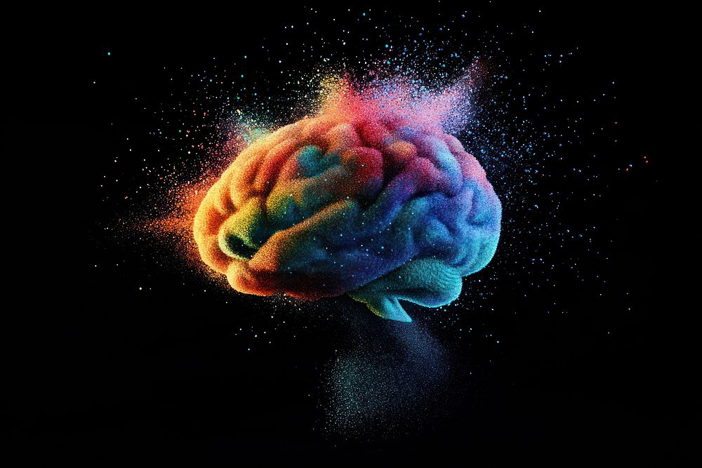 3D render of a colorful powder explosion in the shape of a brain on a black background creative concept design.