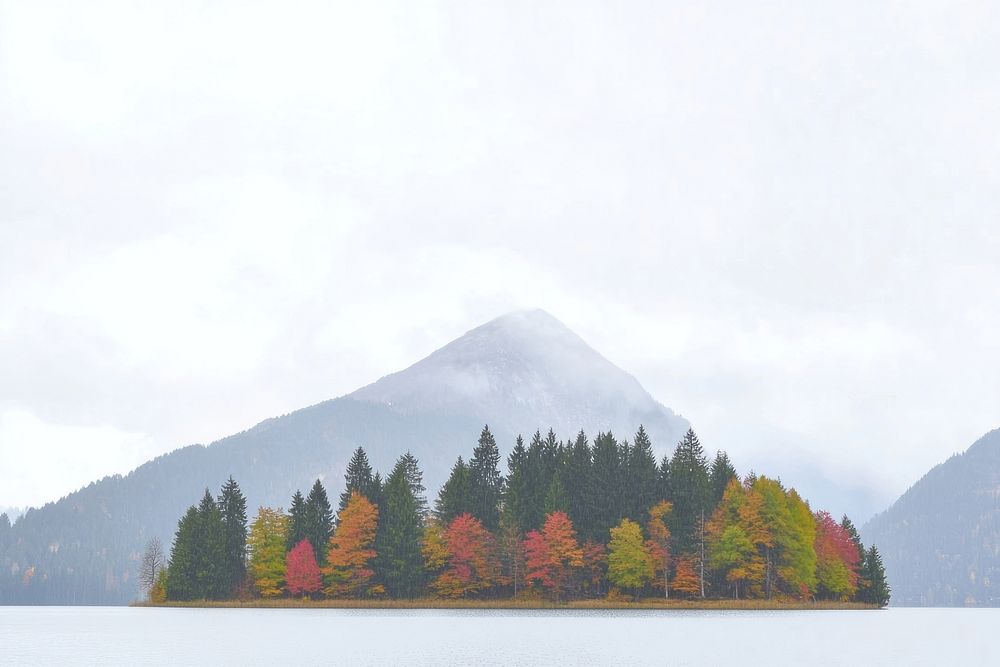 Photography of landscape mountain with lake on white sky nature trees vegetation.