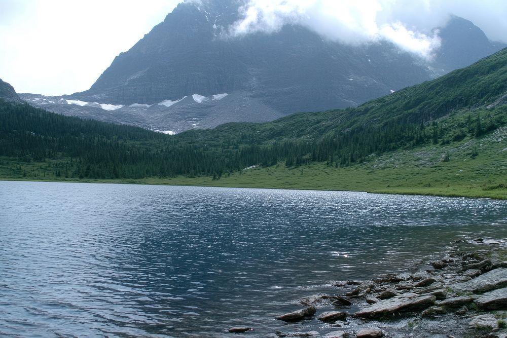 Photography of landscape mountain with lake on white sky wilderness outdoors scenery.