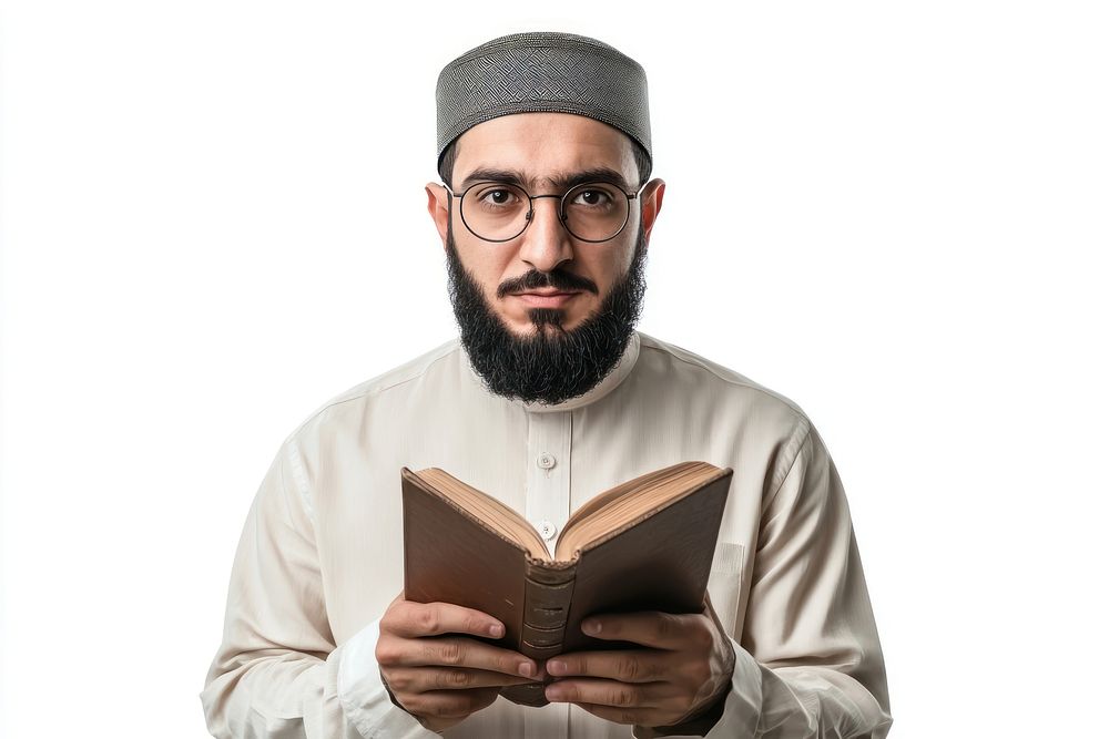 Muslim man holding book background reading glasses.