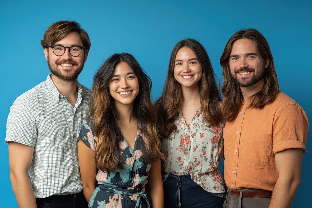 A group of five smiling people person background glasses.