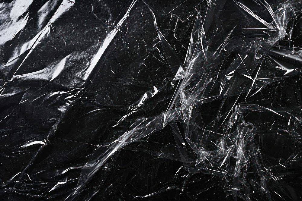 Backgrounds black plastic wrap complexity.