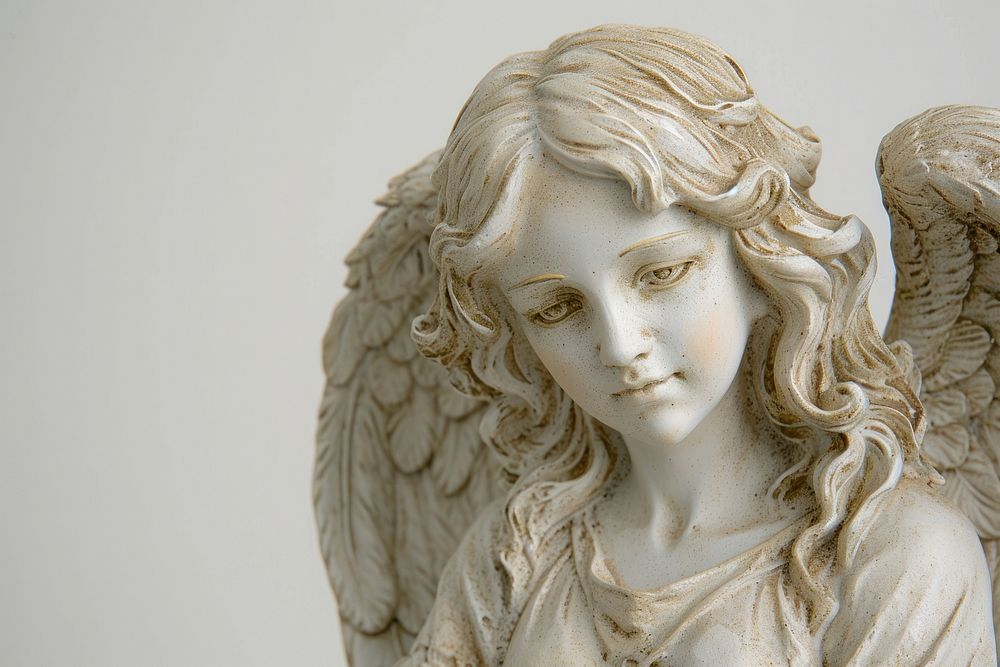 Angel guardian statue art representation spirituality.