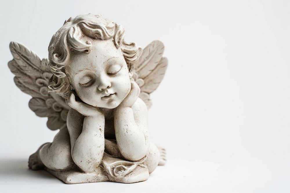 Baby angel guardian statue figurine art representation.