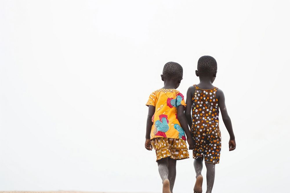 Smiling African kids walking child togetherness.