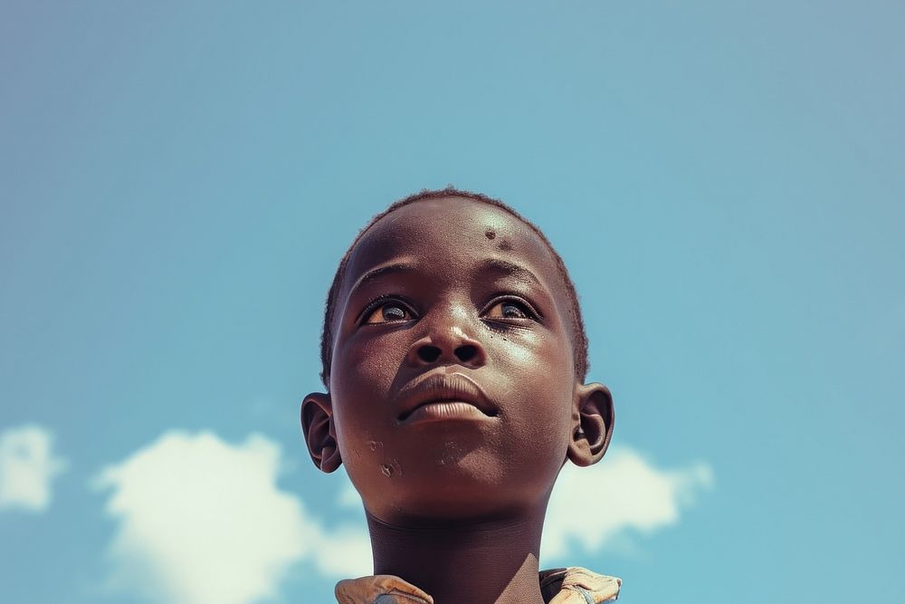 African kid portrait headshot sunlight.