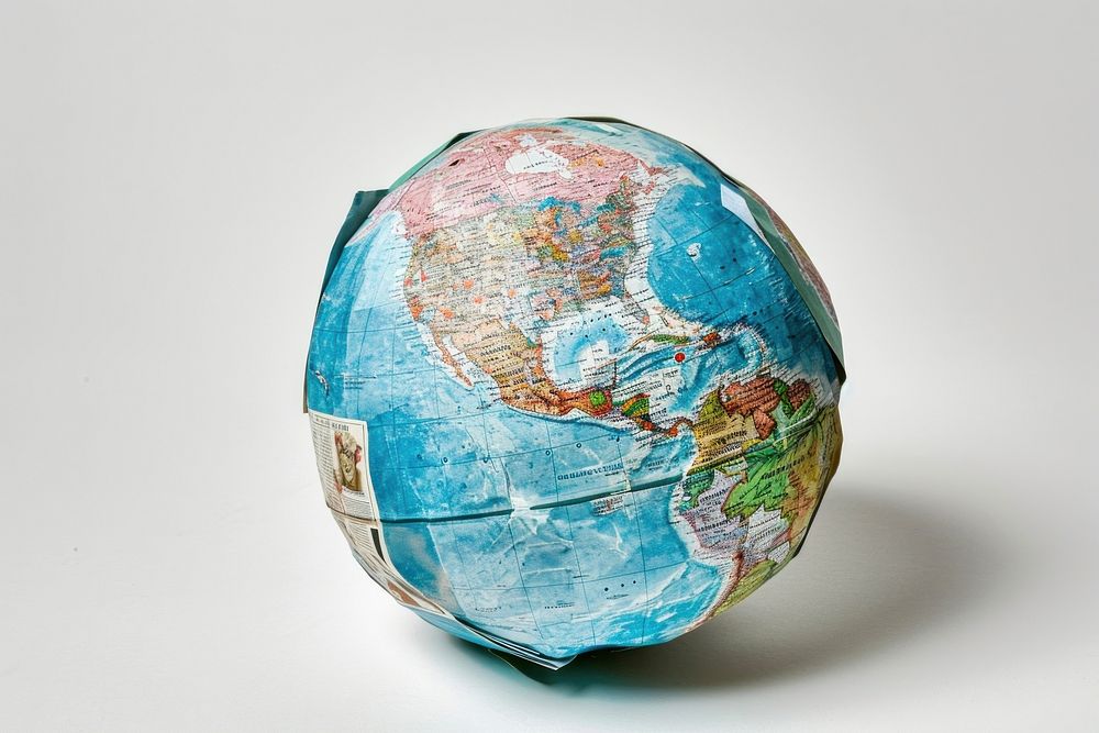 A globe made entirely from Collage paper material sphere planet space.