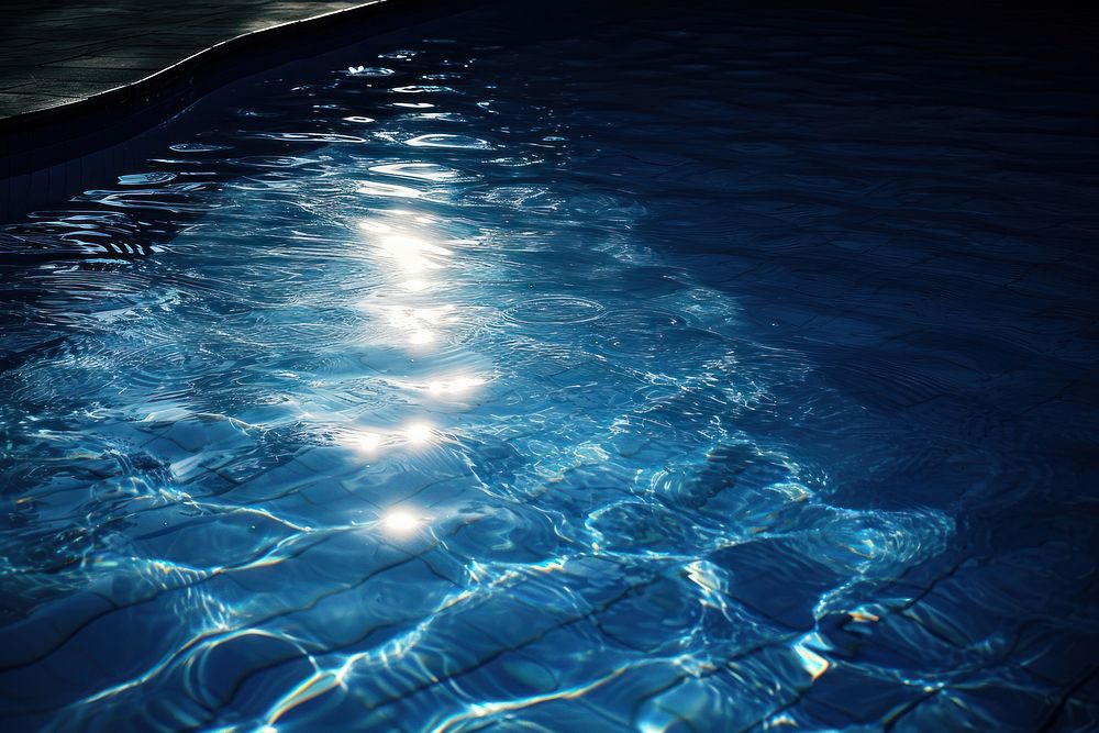Transparent Swimming pool sunlight reflections swimming outdoors nature.