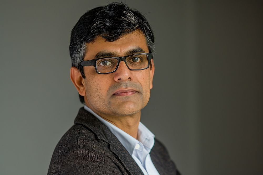 Indian businessman portrait glasses adult.