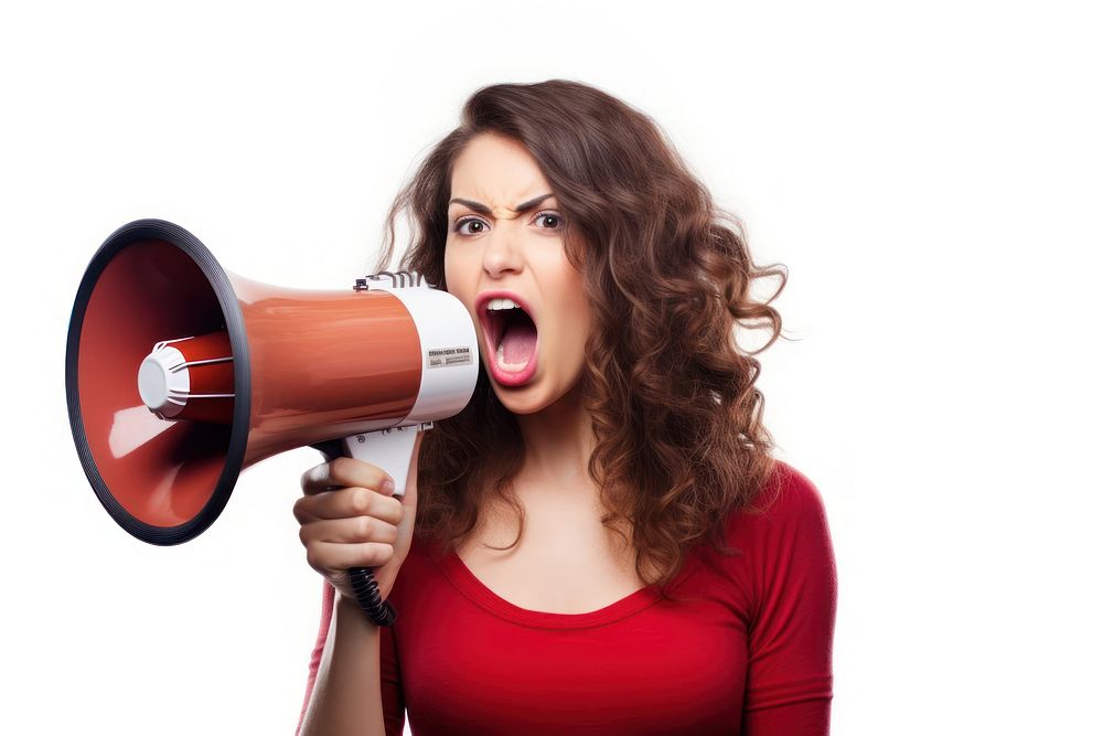 An attractive young woman using a megaphone shouting white background aggression. AI generated Image by rawpixel.