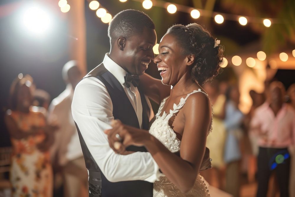 Black couple dancing at their wedding reception adult bride togetherness.