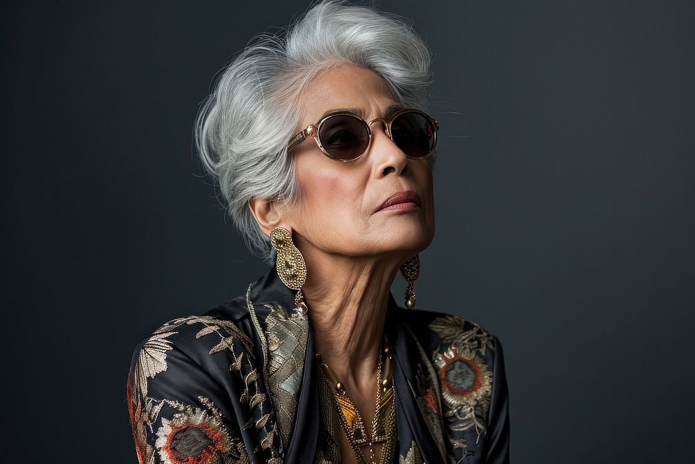 Indian american woman sunglasses portrait jewelry.