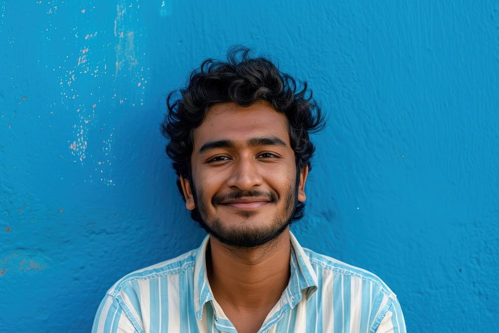 Indian man adult smile blue.