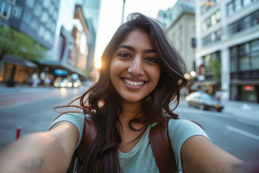 Indian american woman selfie city portrait.