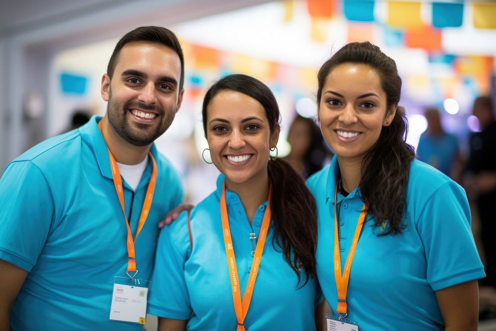 Three indians wear volunteer shirts adult nurse smile. 