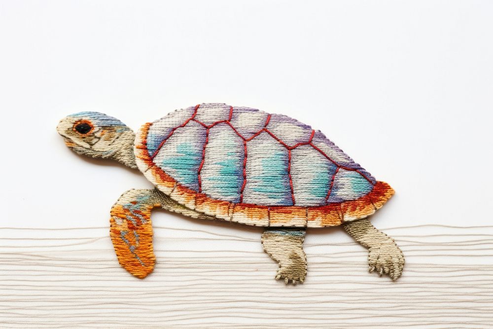Embroidery of turtle reptile animal art.