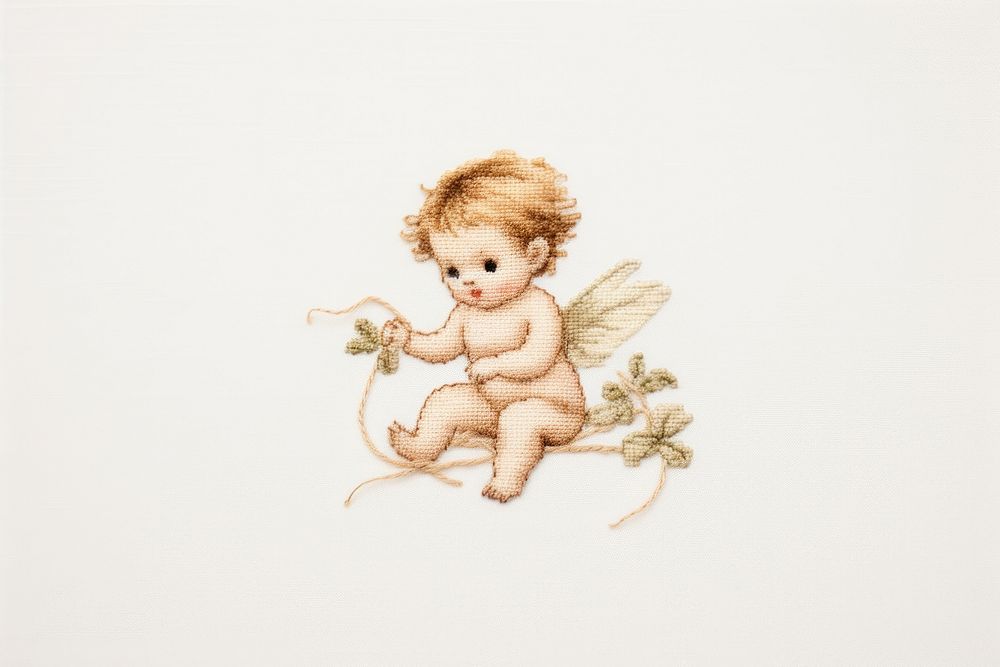 Embroidery of cherub baby representation creativity.
