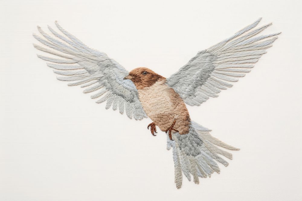 Embroidery of dove animal flying bird.