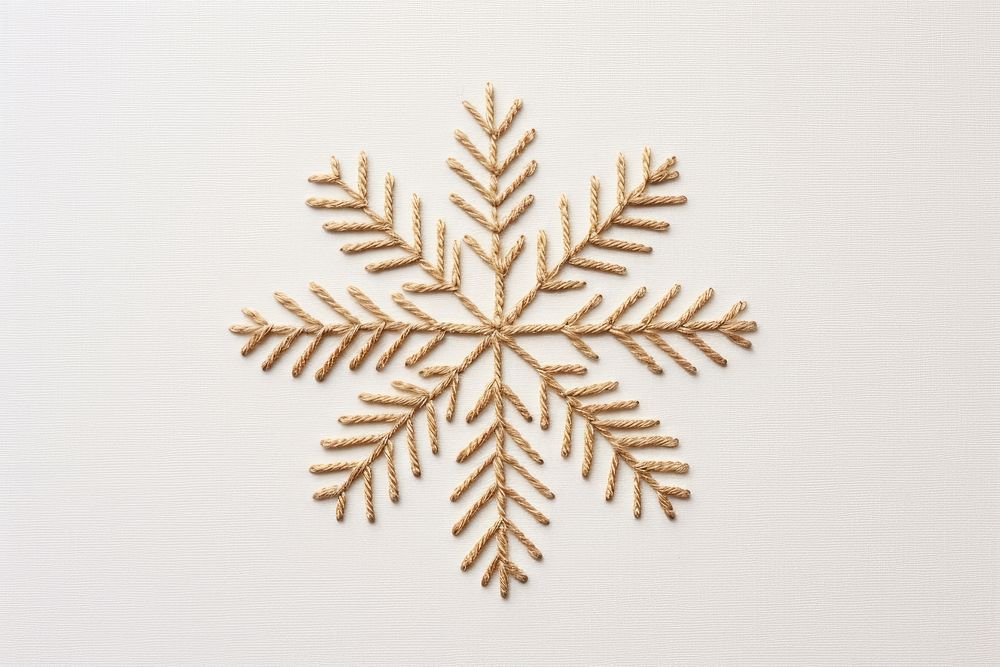 Embroidery of snowflake pattern stitch white.