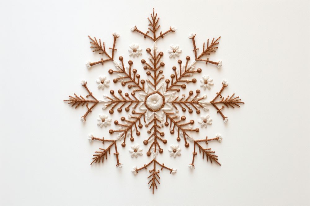 Embroidery of snowflake pattern white art.
