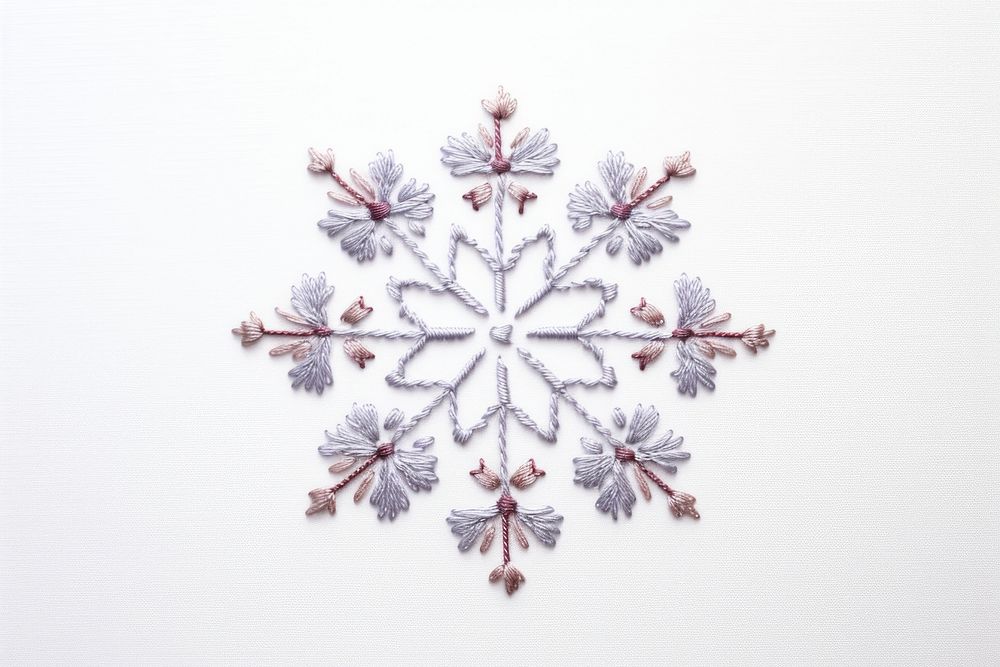 Embroidery of snowflake pattern white celebration.
