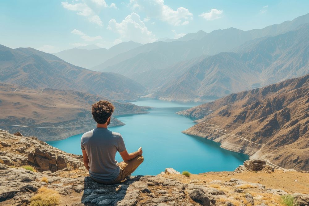 Traveler Middle eastern Man relaxing lake landscape mountain.