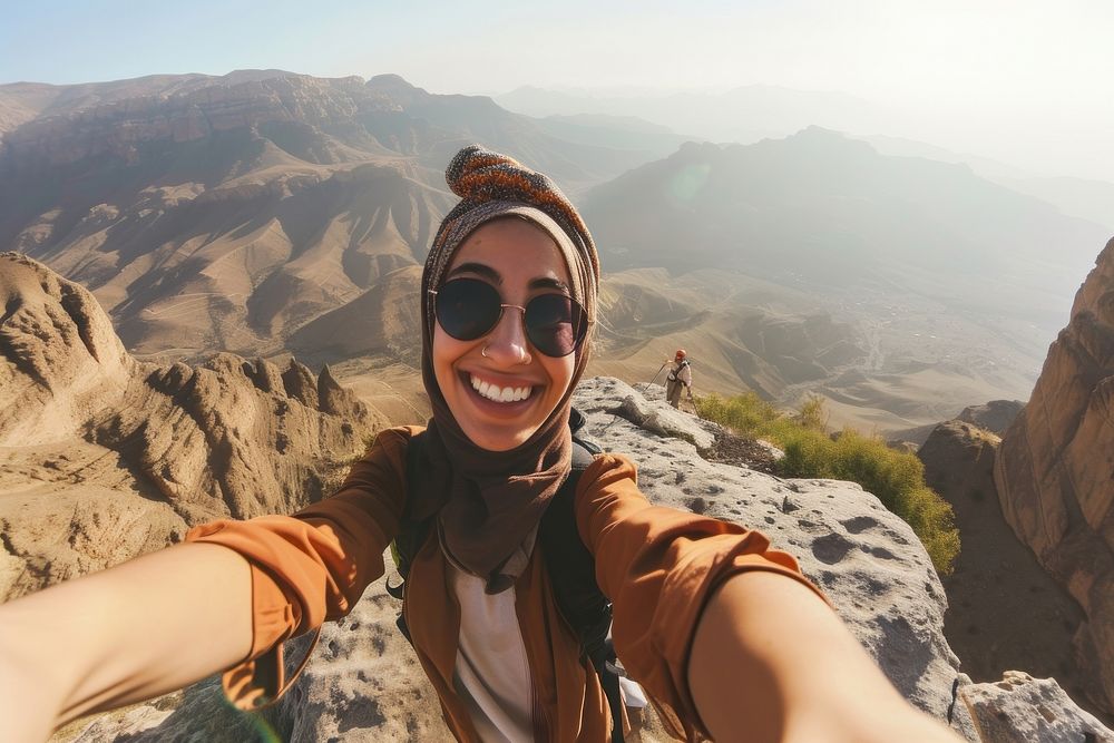 Young hiker Middle eastern women taking selfie mountain portrait hiking.