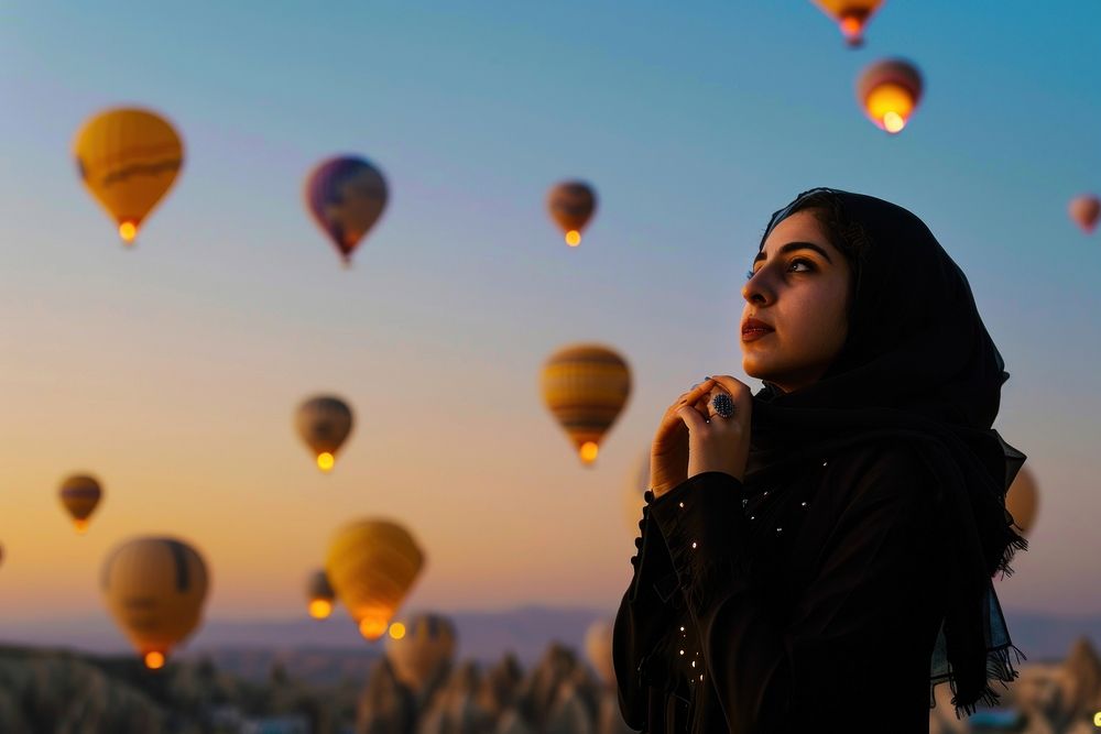 Young Middle eastern yong girl balloon adult hot air balloon.