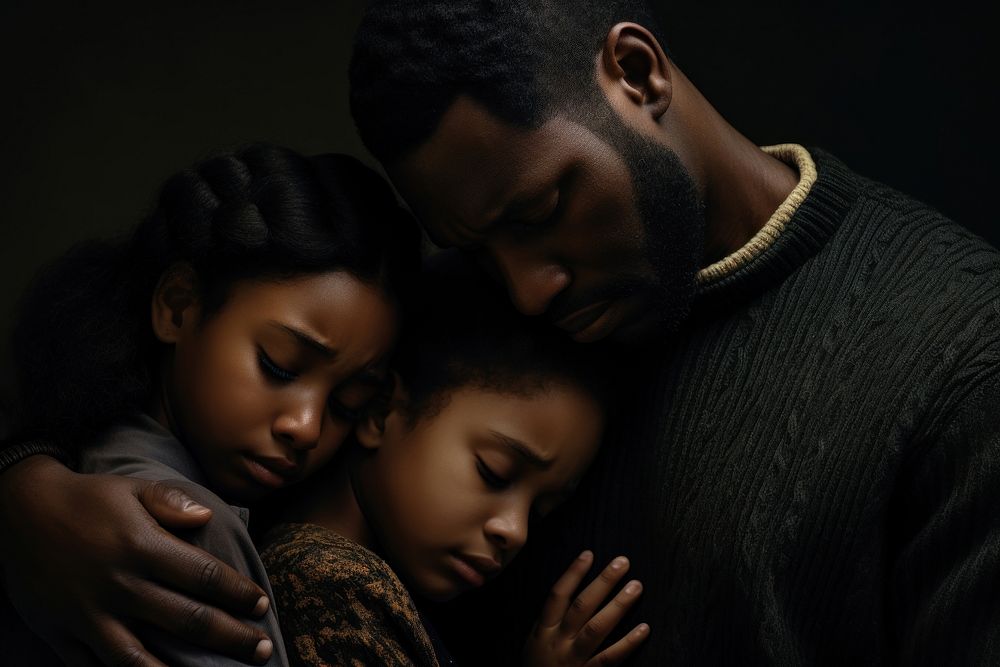 African American family adult hug togetherness.