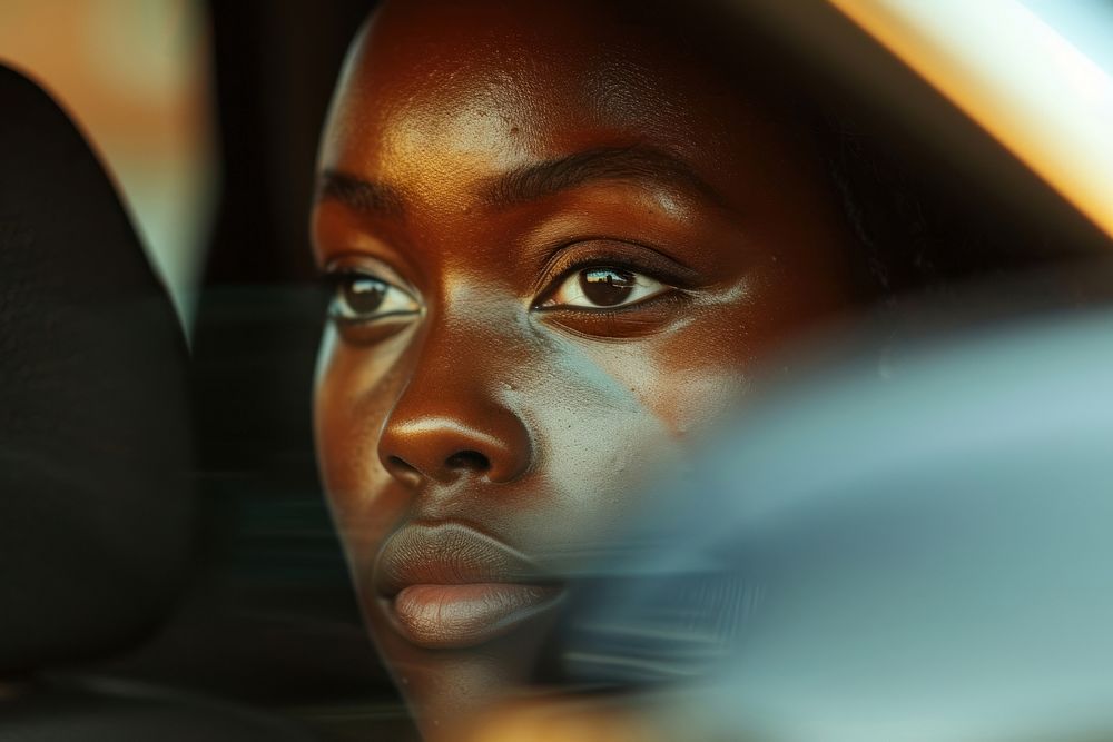 Black woman in Side view mirror photography portrait adult.