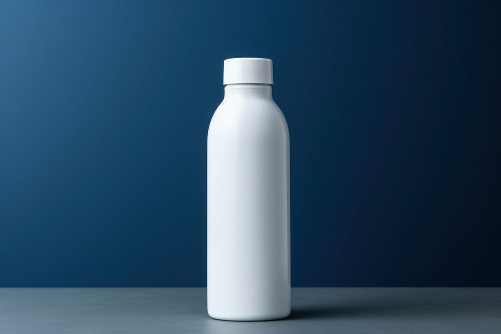 White blank bottle  porcelain cylinder blue.