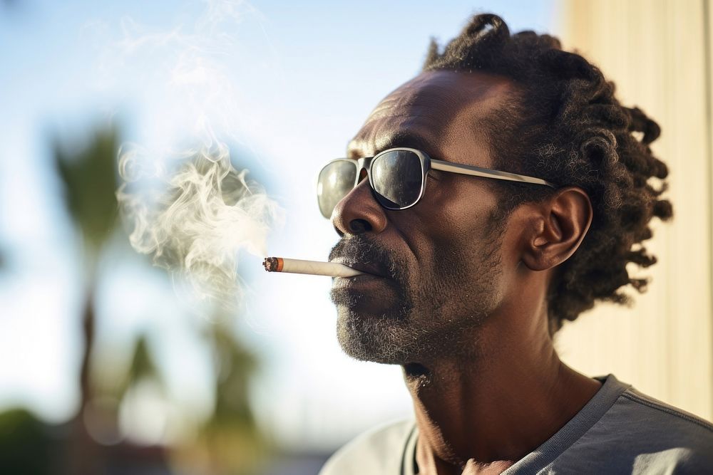 Black man smoking glasses smoke adult.