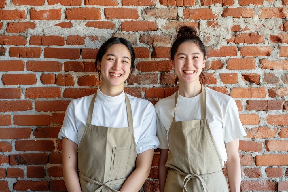 Waiters smile brick apron.