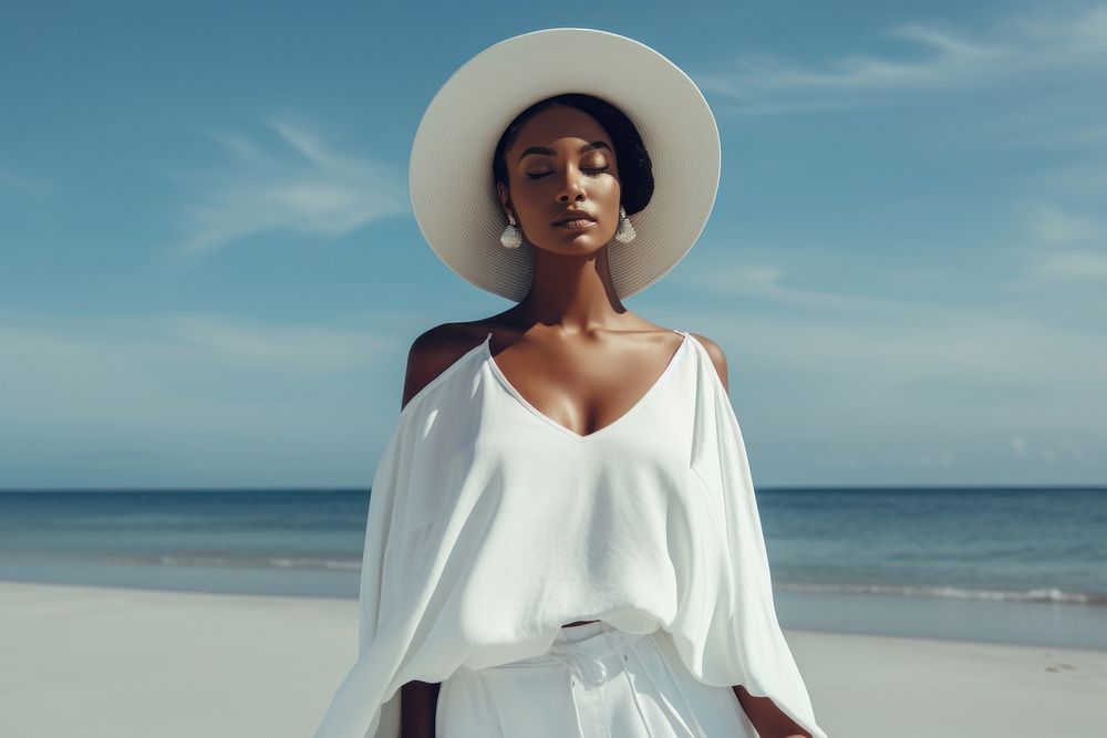 Black woman wear minimal beach fashionable wearing pale white outfit portrait adult tranquility.