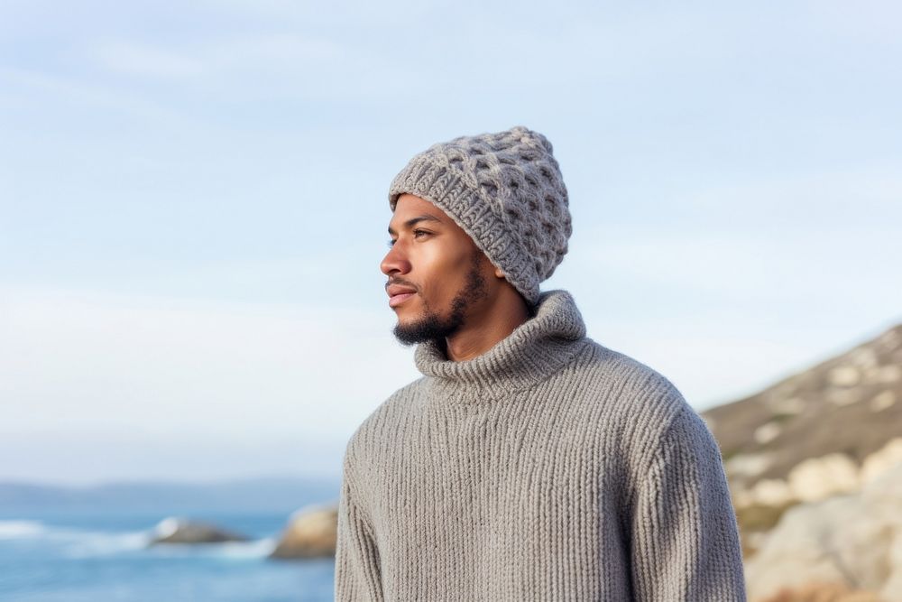 African american man sweater sky hat.