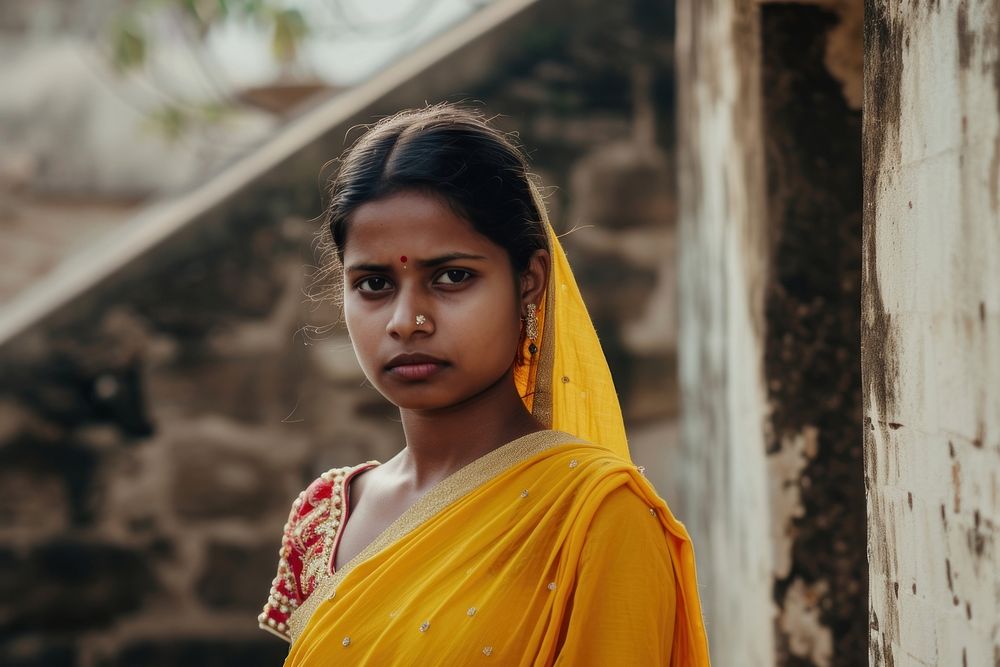 Confident Indian woman looking adult contemplation.