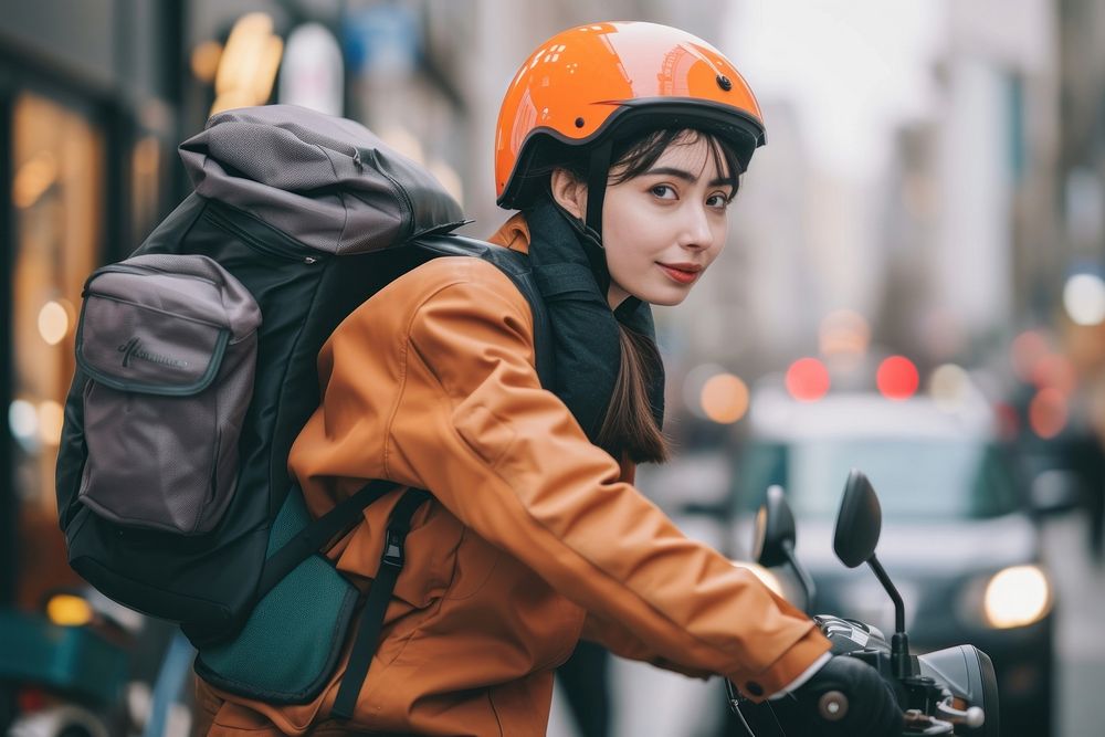Female multi ethnic food delivery rider backpack helmet adult.