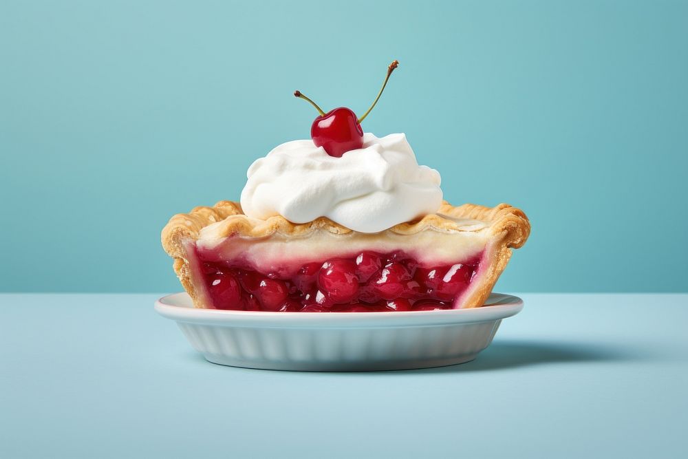 Pie and a cheery on top dessert cream fruit.