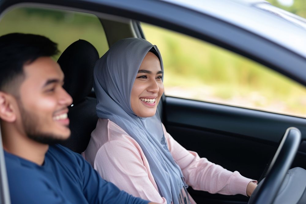 Millennial arab female journey vehicle smiling.