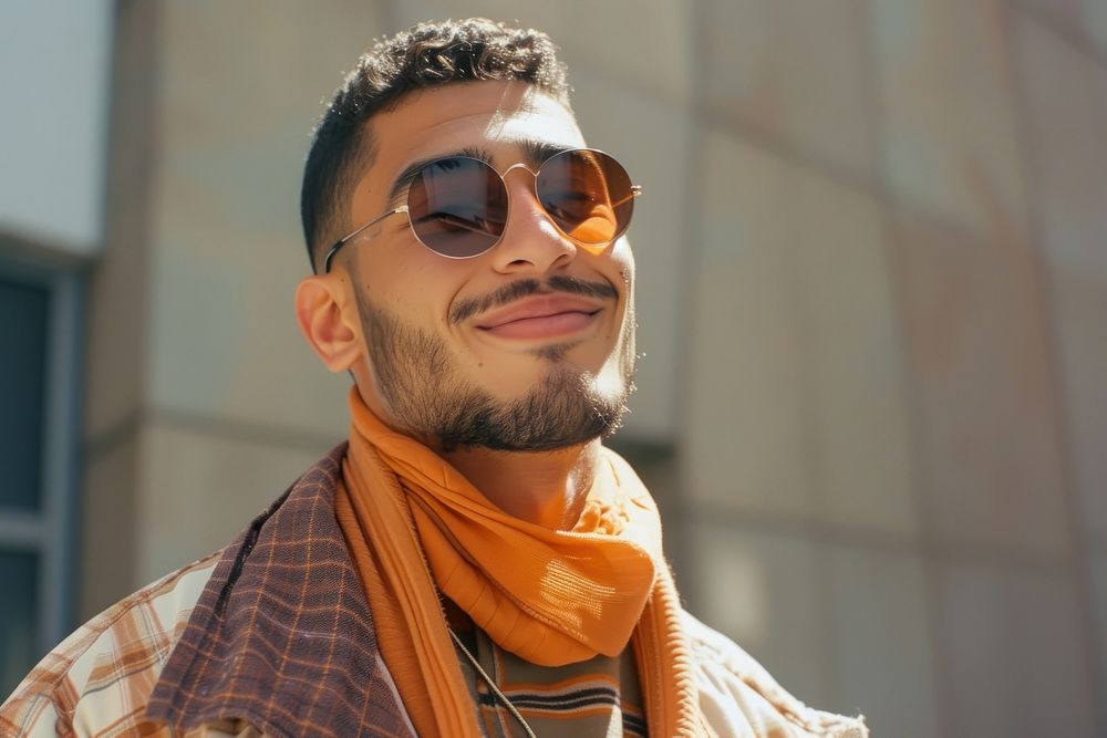 Middle Eastern man happy face sunglasses portrait fashion.