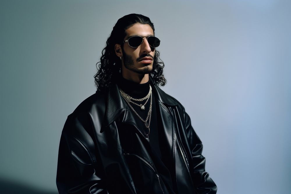 Middle Eastern man photography sunglasses portrait.