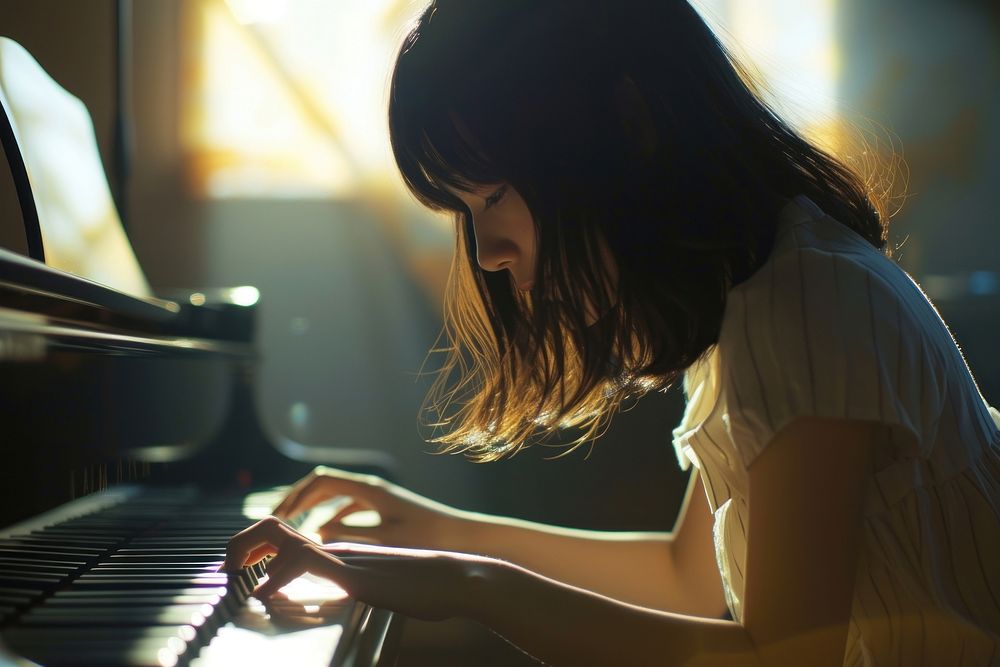 Japanese high school woman piano keyboard musician.