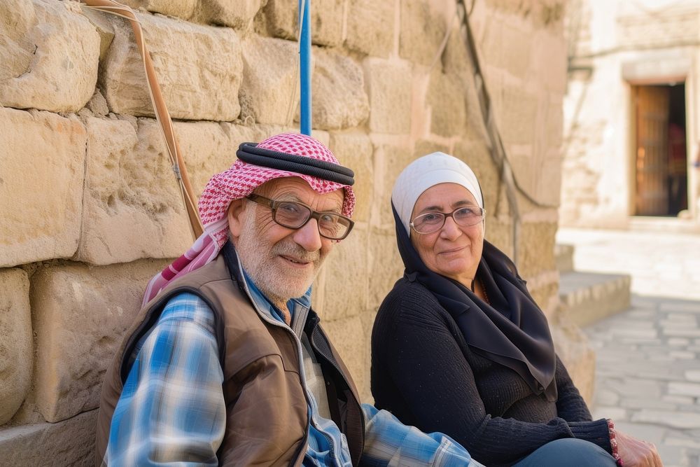 Middle eastern senior couple portrait architecture outdoors.