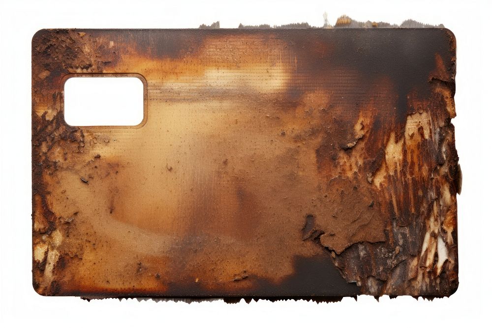 Credit card with burnt rust white background weathered.