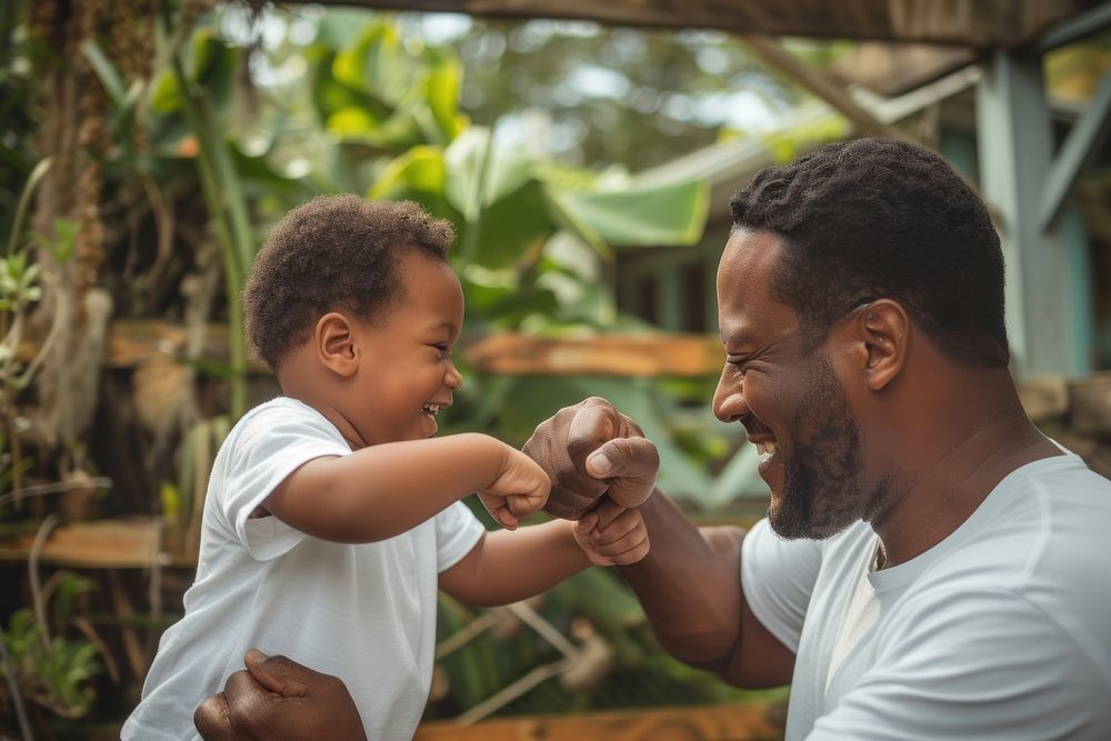 African American father and son portrait family child.